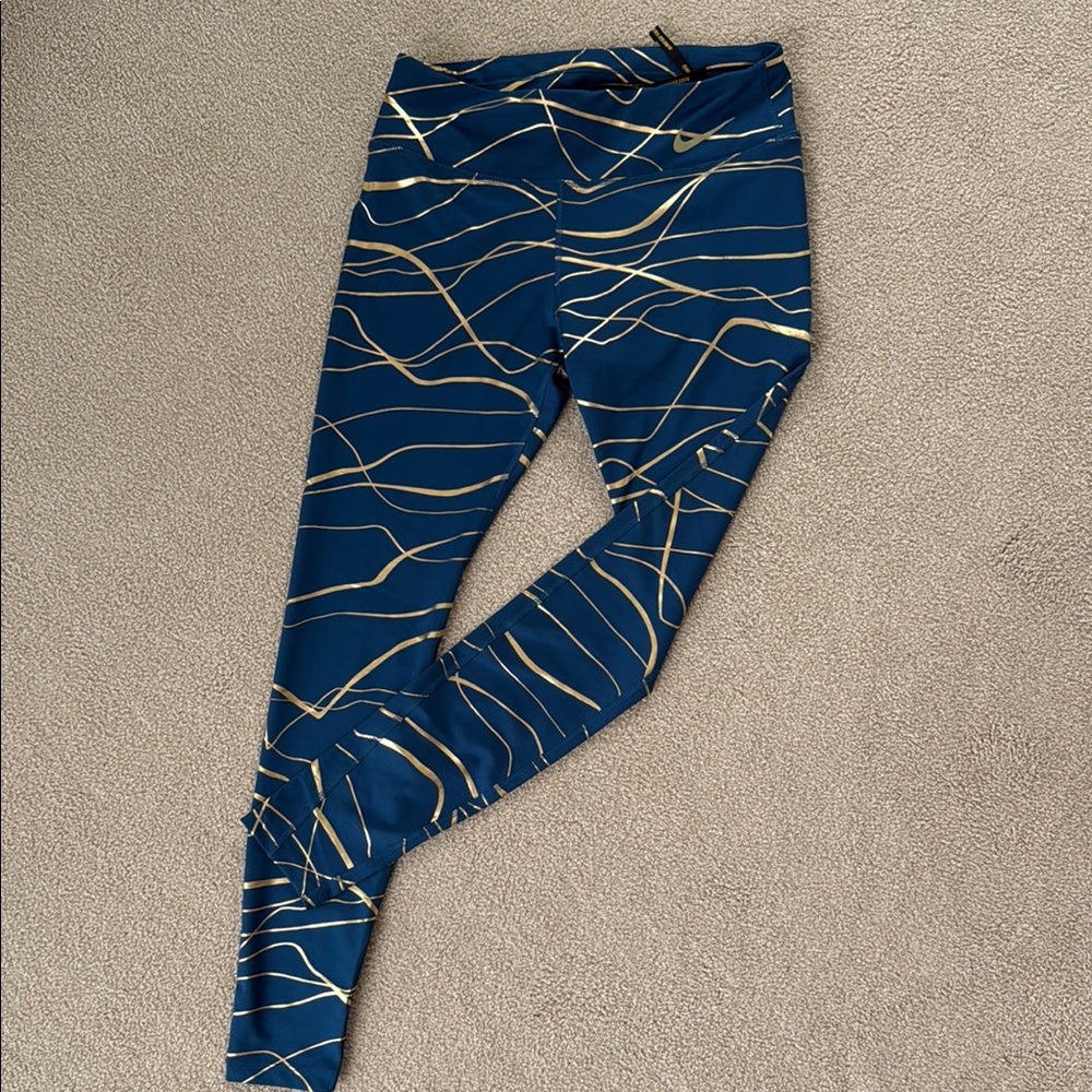 Nike Wimen’s Blue and Gold Patterned Leggings